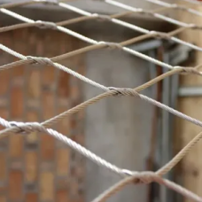 Сетка нержавеющая тросовая с узловым креплением и ромбической ячейкой Н6 7х7 AISI 316 20х35х1 мм